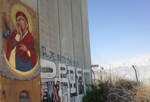 Icon of Mary written on wall dividing Israel and Palestine May 24