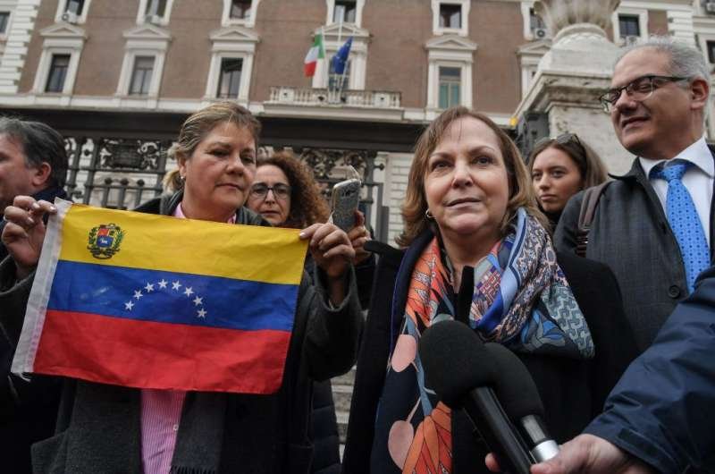 Members of a Venezuelan delegation sent by Venezuelan opposition leader Juan Guaido to meet with Italy's Interior Minister pose in Rome
