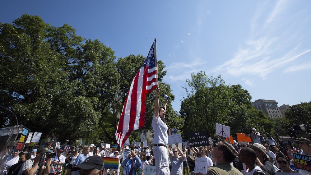 Demonstrators in Washington protest the Trump administration's immigration policy during a national day of action called "Keep Families Together" June 30. (CNS photo/Tyler Orsburn)