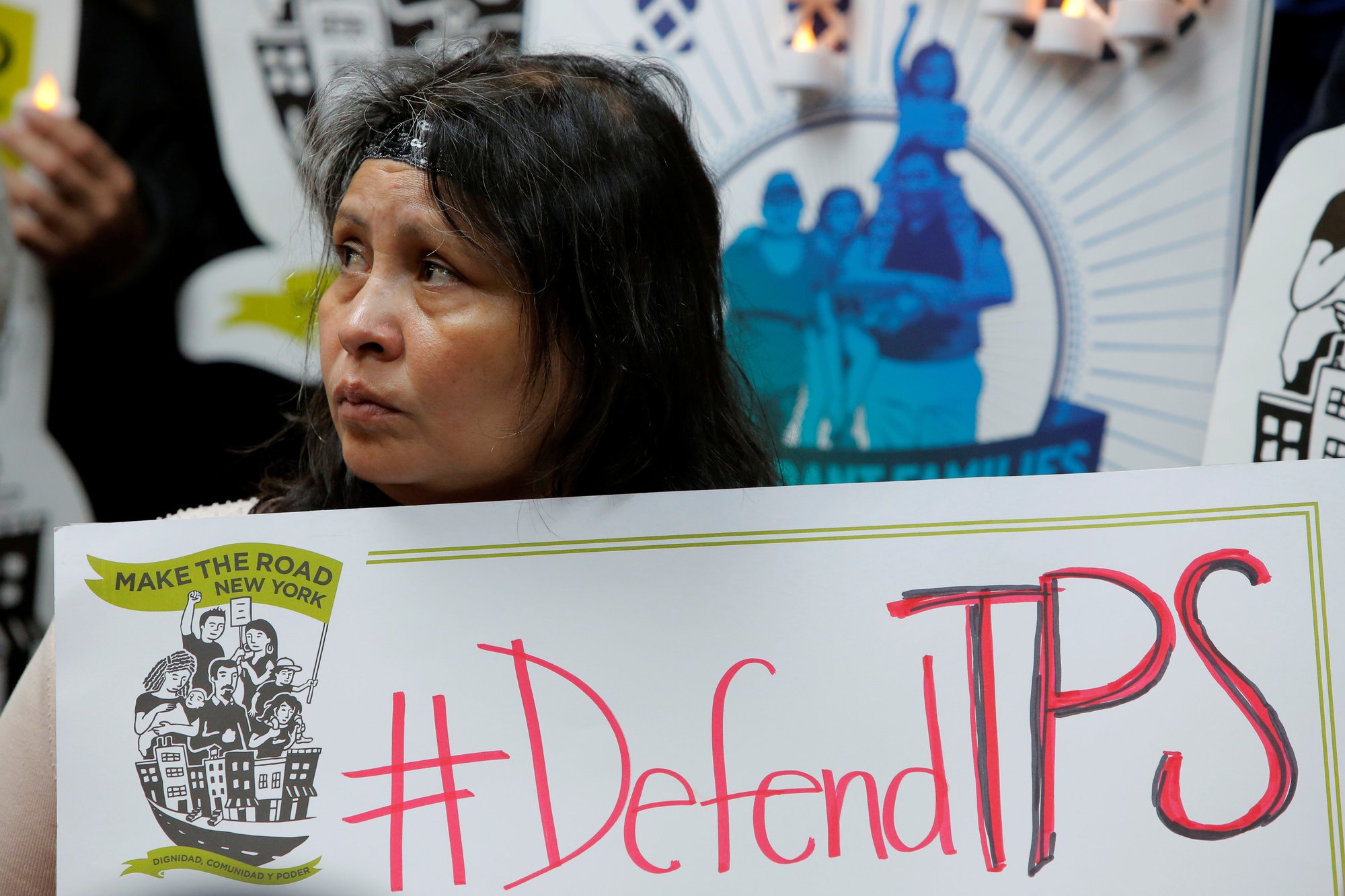 Salvadoran immigrant Mirna Portillo listens during a news conference Jan. 8 at the New York Immigration Coalition in Manhattan following U.S. President Donald Trump's announcement to end the Temporary Protected Status for Salvadoran immigrants. (CNS photo/Andrew Kelly