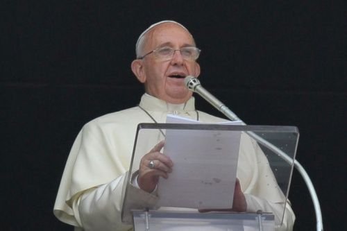 Pope Francis speaks to the crowd gathered in St Peter's Square on June 15