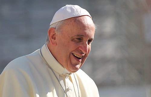 Pope Francis greets pilgrims in St. Peter's Square before the Wednesday general audience on October 2