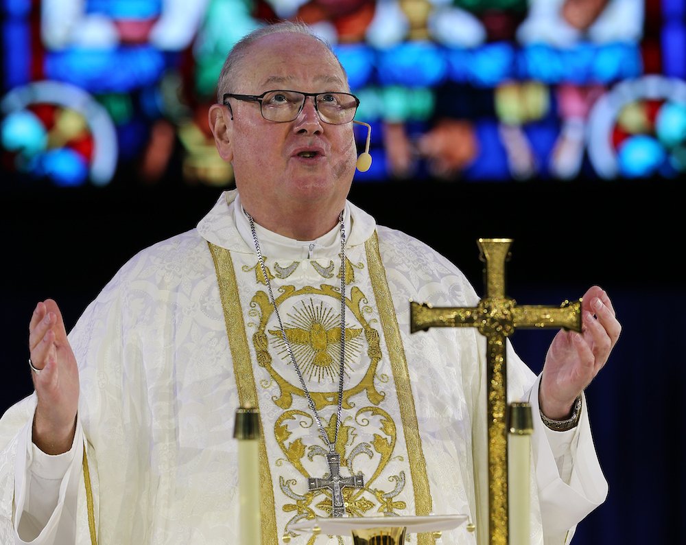New York Cardinal Timothy M. Dolan celebrates Mass during the Catholic convocation in Orlando