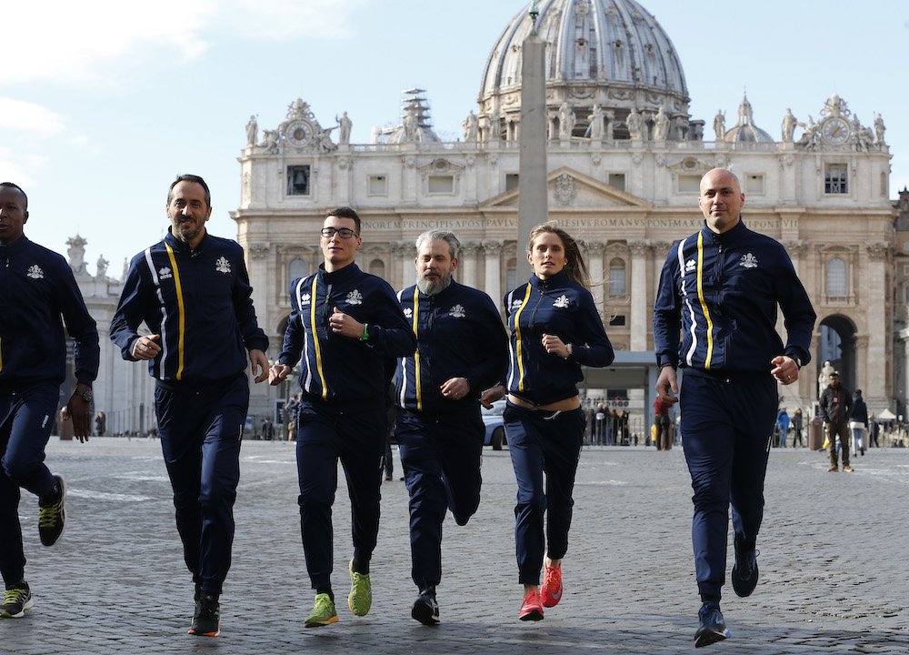 Members of the new Vatican Athletic sports association run during a photo opportunity outside St. Peter's Square at the Vatican Jan. 10. The Vatican announced the formation of the association