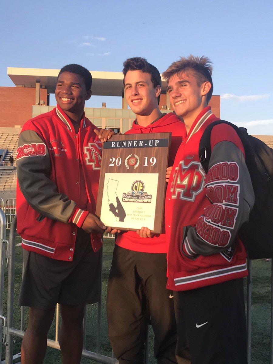 Mater Dei track team members display their CIF plaque. (PHOTO COURTESY MD ATHLETICS TWITTER)