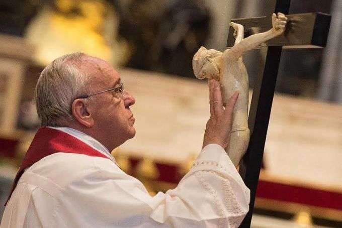 Pope Francis venerates the cross on Good Friday