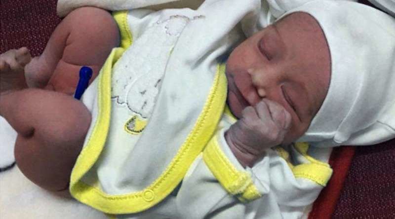 A newborn child rescued from a sentence of death in northern Iraq. Credit: Aid to the Church in Need