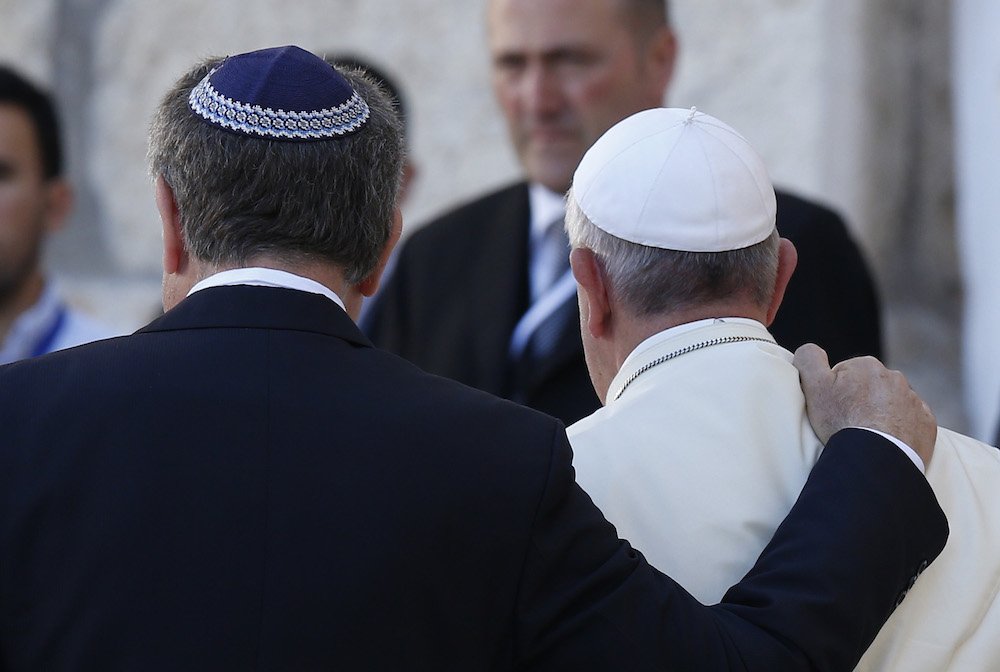 Rabbi Abraham Skorka of Buenos Aires and Pope Francis embrace after visiting the Western Wall in Jerusalem May 26