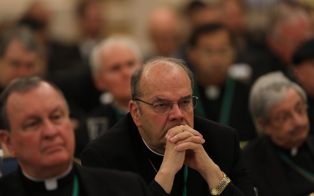 Bishops listen to speakers on the first day of the spring general assembly of the U.S. Conference of Catholic Bishops in Baltimore June 11