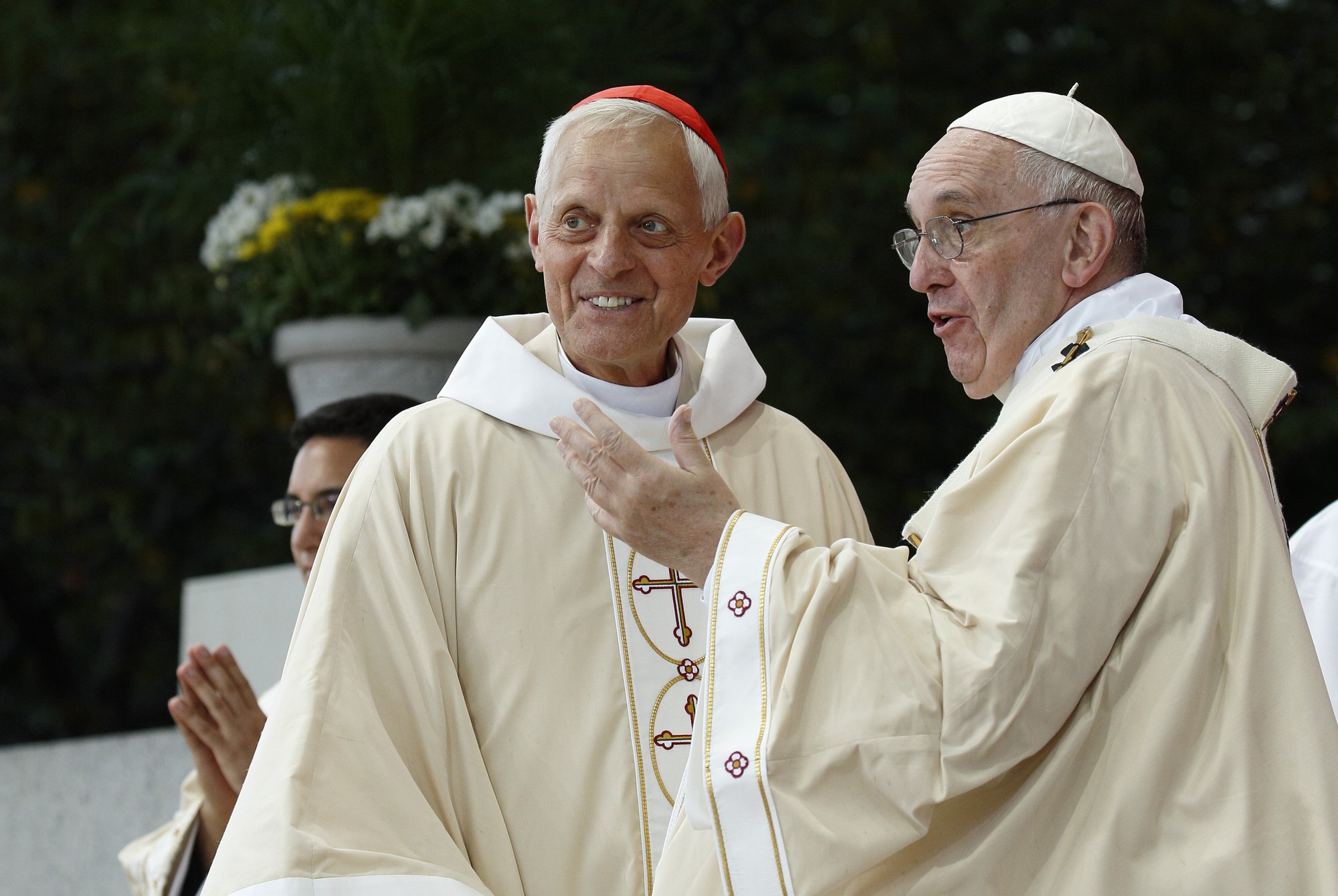 Cardinal Donald W. Wuerl of Washington is pictured with Pope Francis during the pope's Mass in Washington Sept. 23