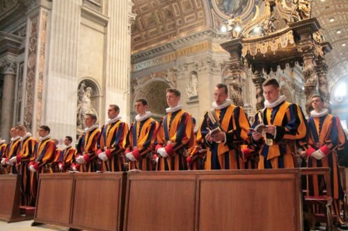 Swiss Guards attend a Mass prior to the swearing-in of their new members