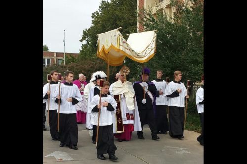 Archbishop Paul Coakley of Oklahoma City carries the Eucharist in procession Sept. 21 to counter a black mass held at the city's civic music hall. Credit: Archdiocese of Oklahoma City.