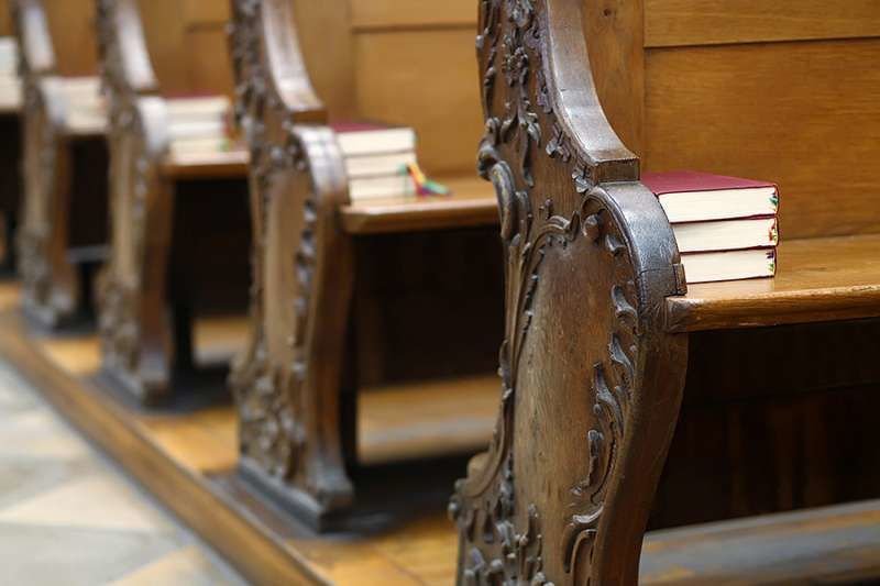 Church pews. Credit: Goran Bogicevic/Shutterstock.