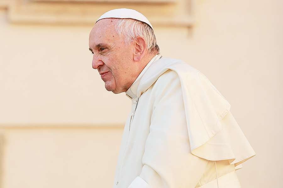 Pope Francis greets pilgrims in St. Peter's Square at the general audience on Oct. 19
