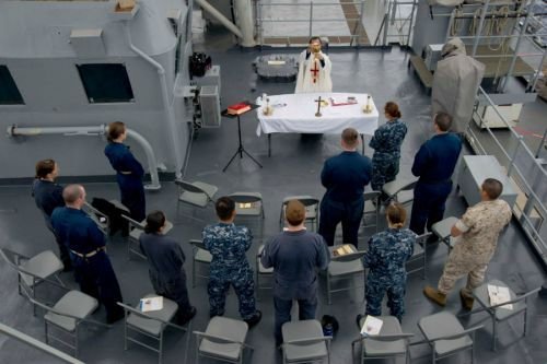 US Navy Chaplain Lt. Tung Tran says Mass aboard the USS Rushmore