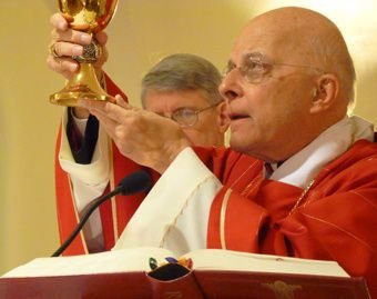 Cardinal Francis George celebrates Mass at the tomb of St. Peter during his February 2012 ad limina visit to the Vatican. Credit: CNA.