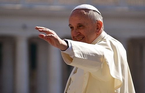 Pope Francis greets pilgrims in St. Peter's Square during the Wednesday general audience on June 4