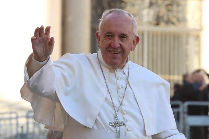 Pope Francis greets pilgrims in St. Peter's Square before his Wednesday general audience Dec. 2