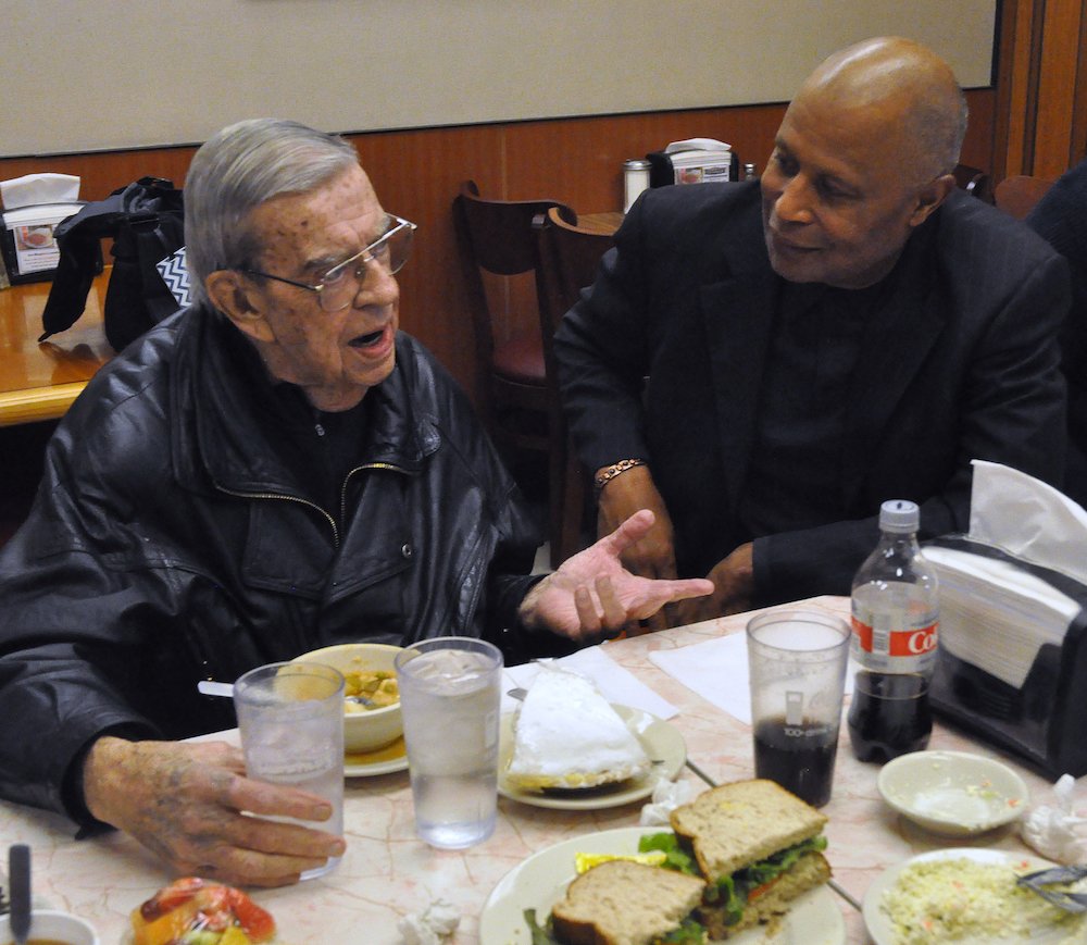 John Welch and David Shaheed share a conversation during lunch at Shapiro's Delicatessen in Indianapolis Jan. 11