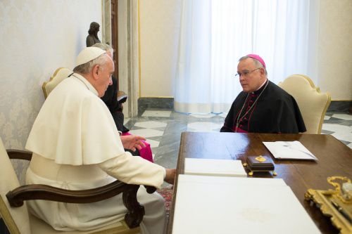 Pope Francis meets with Archbishop Charles Chaput of Philadelphia at the Vatican on Feb. 6