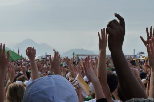 World Youth Day pilgims take part in a flashmob dance at the beginning of the closing Mass June 28