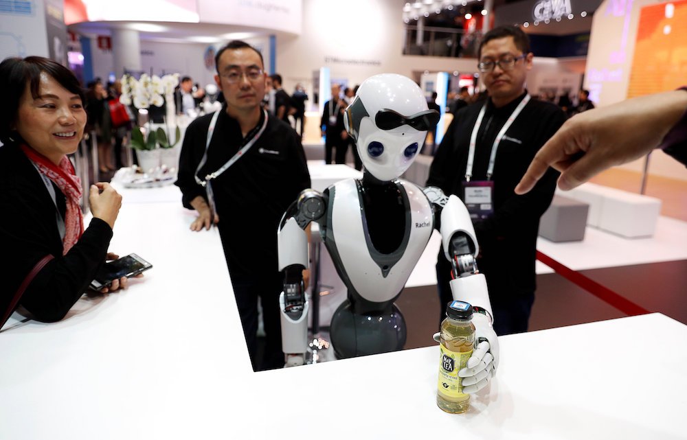 The CloudMinds XR-1 robot performs for visitors at the Mobile World Congress in Barcelona