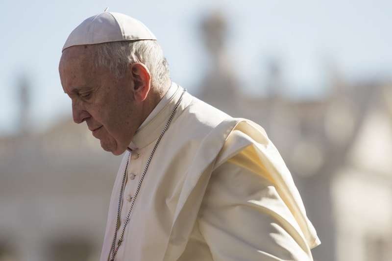 Pope Francis walks in St. Peter's Square Sept. 12