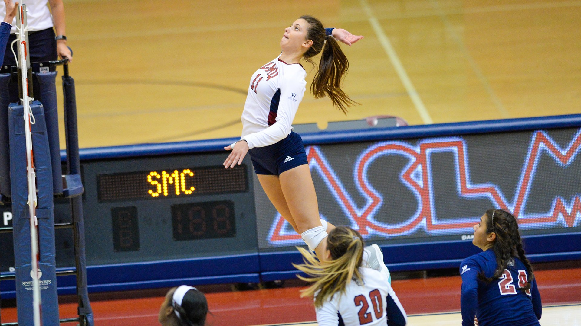 LMU’s Sara Kovac smacks a winner in the Lions’ Aug. 24 win over Hofstra in the Hilton Penn’s Landing Temple Invitational semifinals. LMU captured the title the next day. (PHOTO CREDIT: LMU)