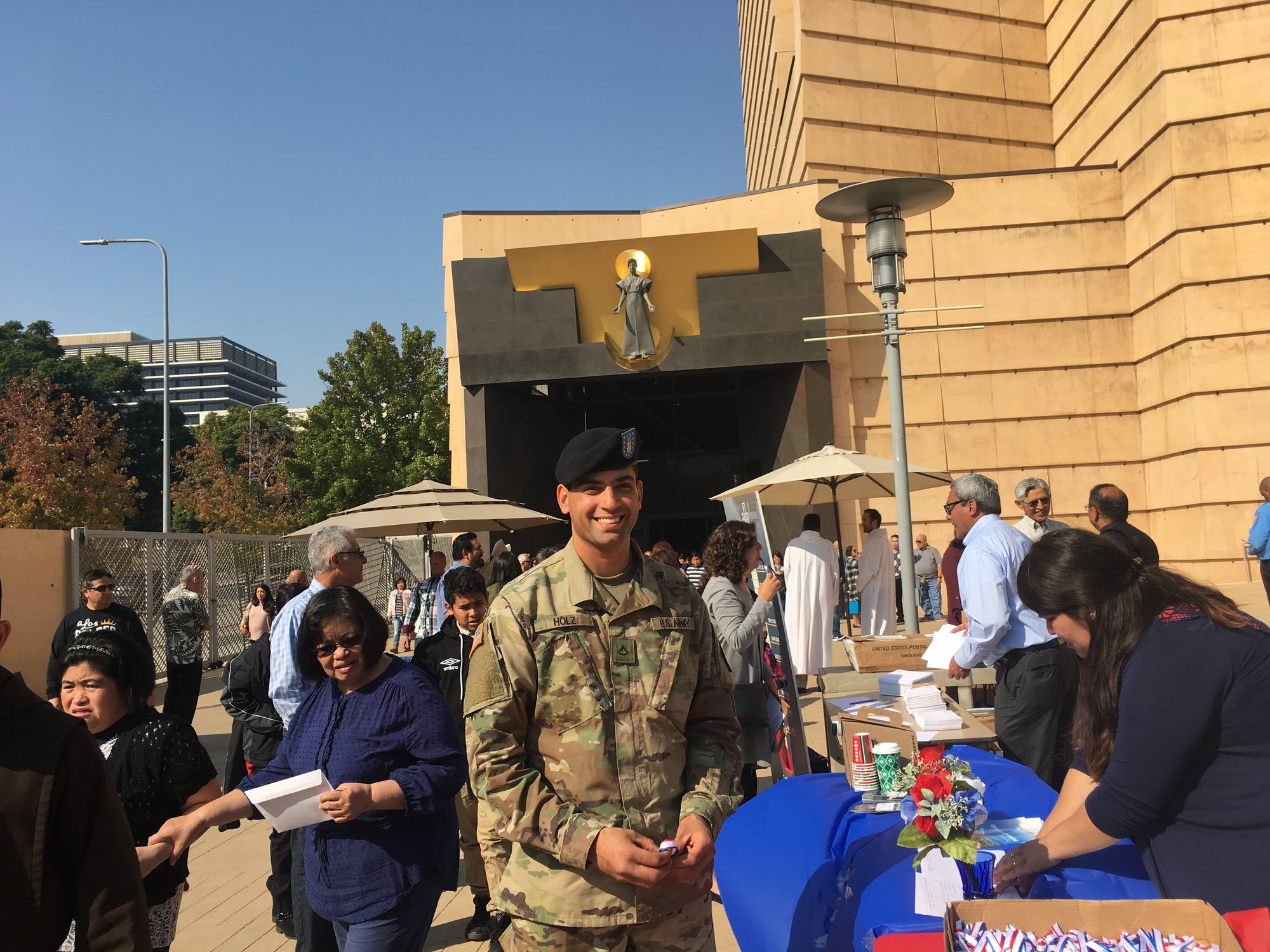 Army veteran M J Holz attends this year's Mass for Veterans in his uniform