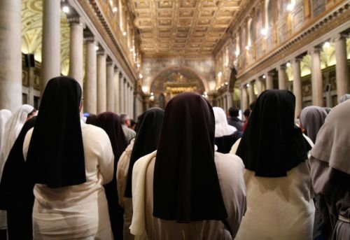 Religious attend the Rome prayer vigil on Nov. 29