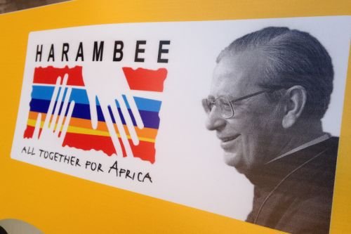 Signs for Harmabee Africa International outside the Basilica of St. Eugene in Rome