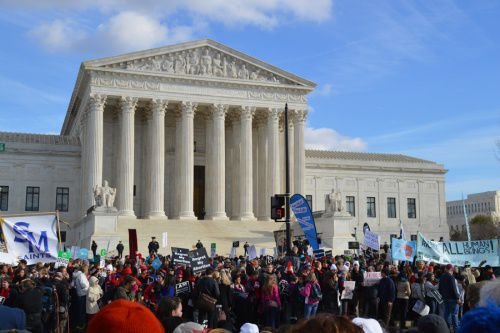 The March for Life passes in front of the Supreme Court building in Washington