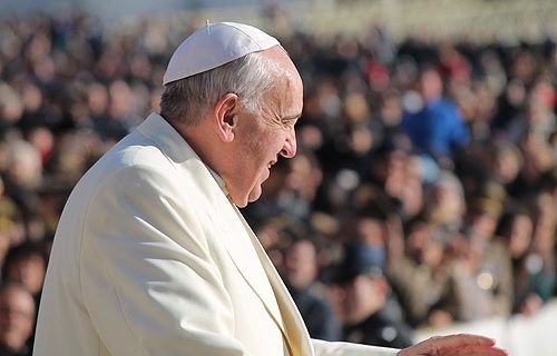 Pope Francis greets pilgrims in St. Peter's Square during the Wednesday general audience on Dec. 4