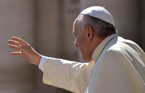 Pope Francis greets pilgrims in St. Peter's Square during the Wednesday general audience June 4