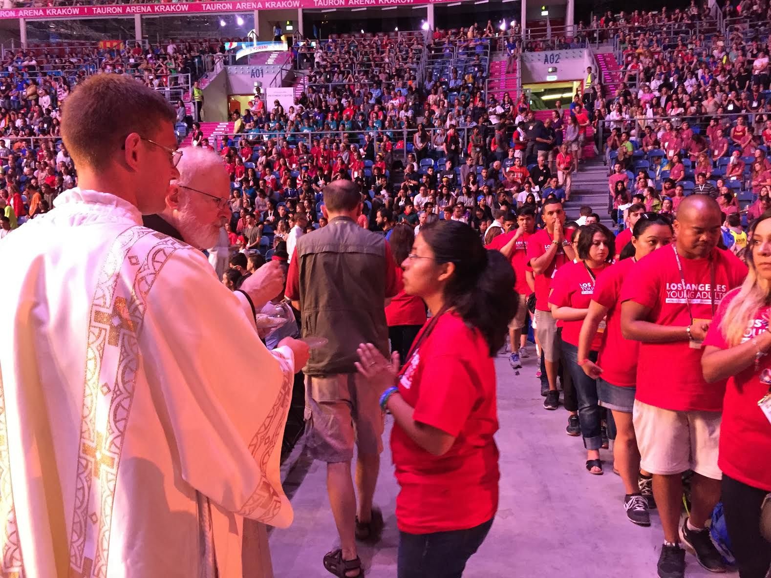 World Youth Day pilgrims from Los Angeles received Holy Eucharist from Boston Cardinal Sean O’Malley. (photo/Adrian Marquez)