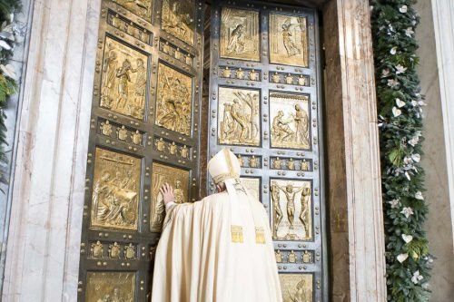 Pope Francis opens the Holy Doors at St. Peter's Basilica to begin the Year of Mercy