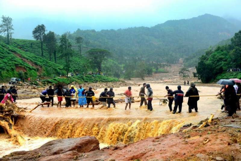 Flood waters after a landslide in the Indian state of Kerala on August 9