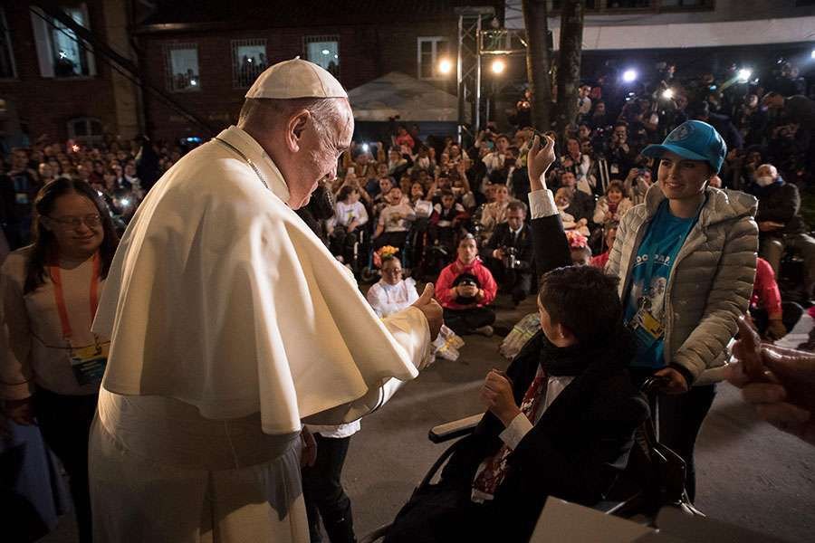 Locals greet Pope Francis in Bogota