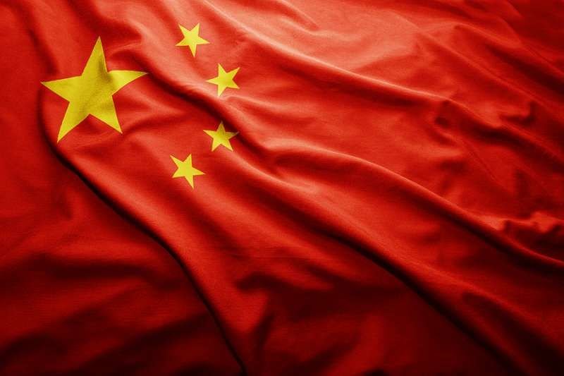 The flag of China. Credit: esfera/Shutterstock.