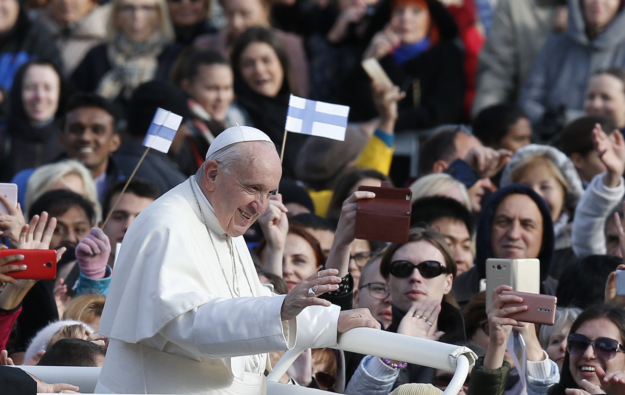 Pope Francis greets the crowd before celebrating Mass in Freedom Square in Tallinn