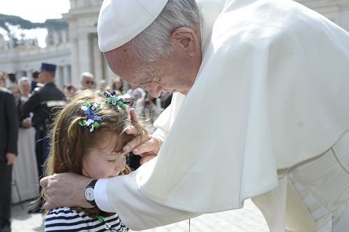 Pope Francis greets Lizzy Myers in St. Peter's Square on April 6
