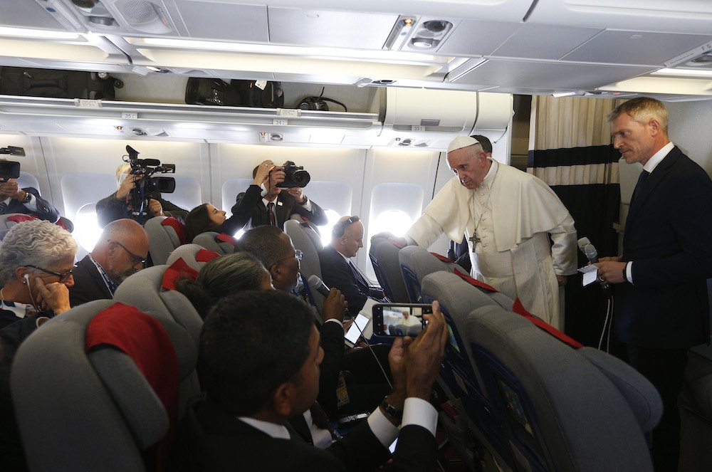 Pope Francis answers questions from journalists aboard his flight from Antananarivo