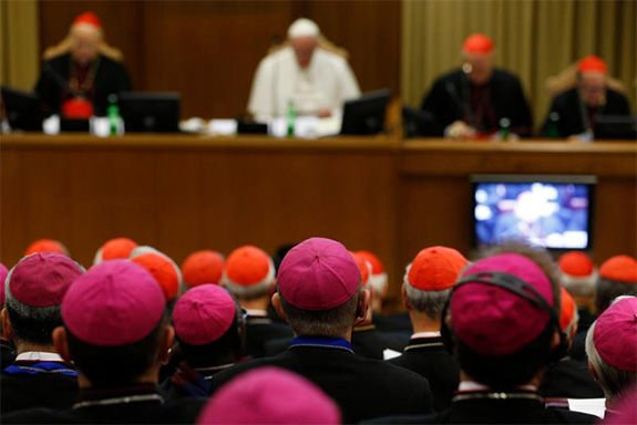 Pope Francis leading a session of the Synod of Bishops attended by bishops and cardinals at the Vatican Oct. 23