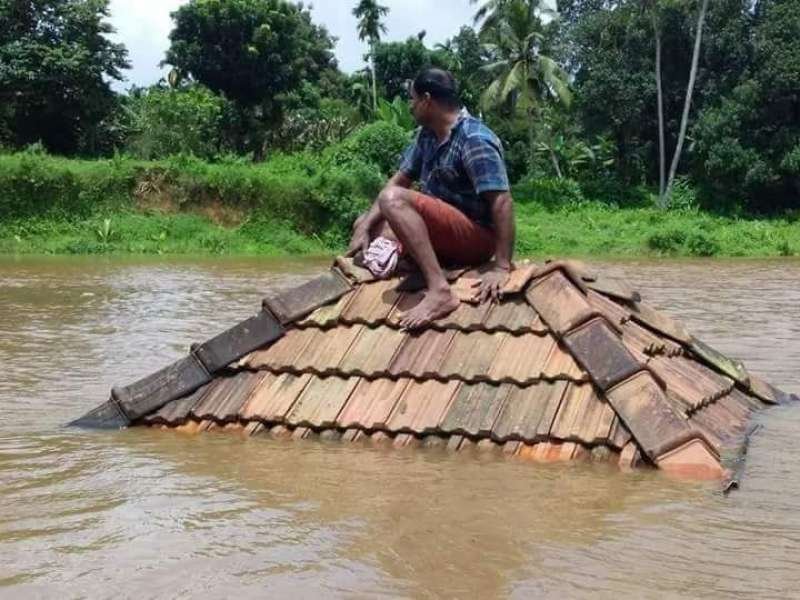 A man trapped by the flood waters in Kerala