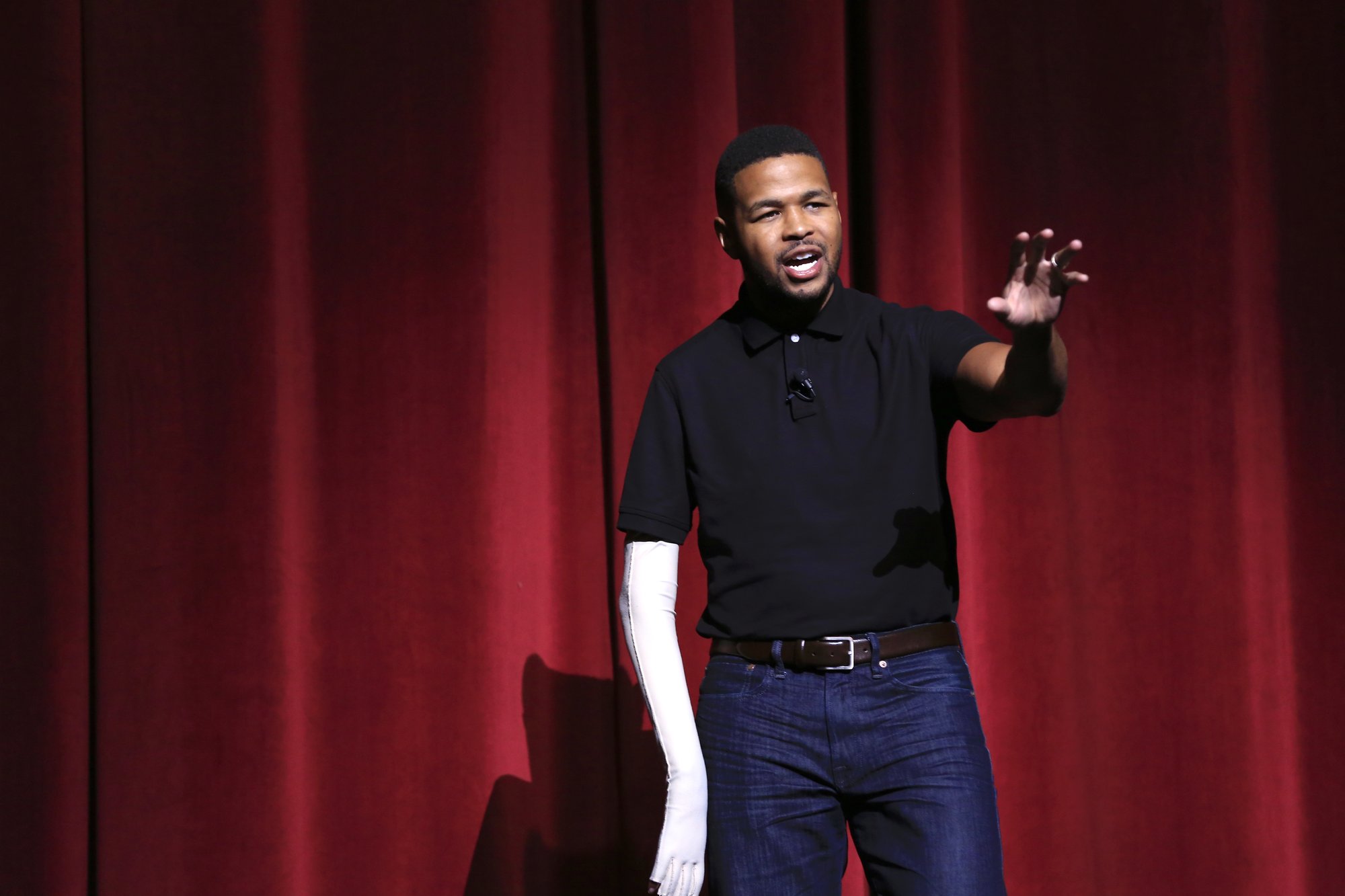 Former college football player Inquoris “Inky” Johnson speaks at Christian Service 4LIFE at Microsoft Theater November 7. (DAVID AMADOR RIVERA)