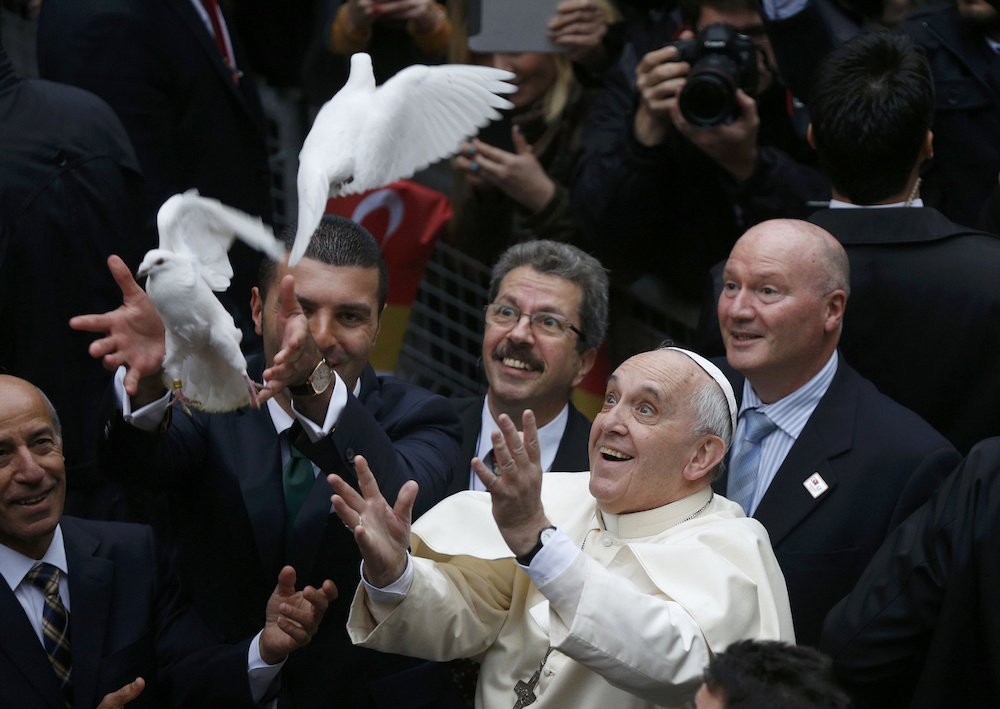 Pope Francis releases doves