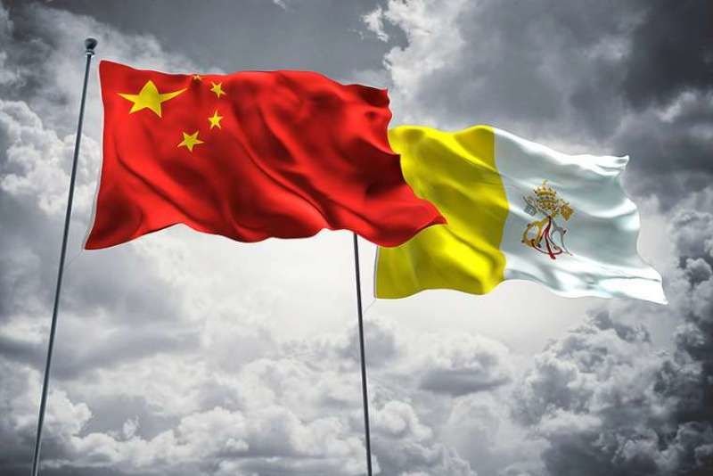 Flags of China and Vatican City. Credit: FreshStock on Shutterstock.