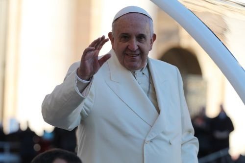 Pope Francis greets pilgrims in St. Peter's Square during his Dec. 10