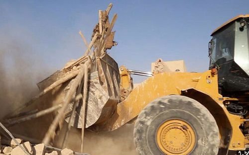 Islamic State released images showing its militants demolishing Mar Elian monastery outside Al Quaryatayn