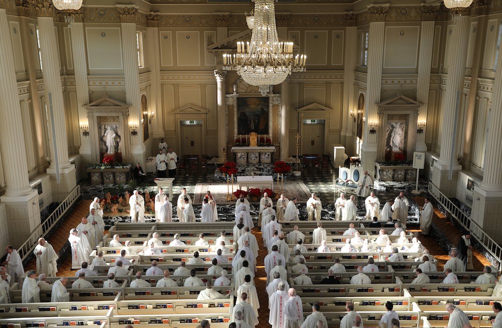 U.S. bishops receive Communion during Mass in the Chapel of the Immaculate Conception at Mundelein Seminary Jan. 3 at the University of St. Mary of the Lake in Illinois